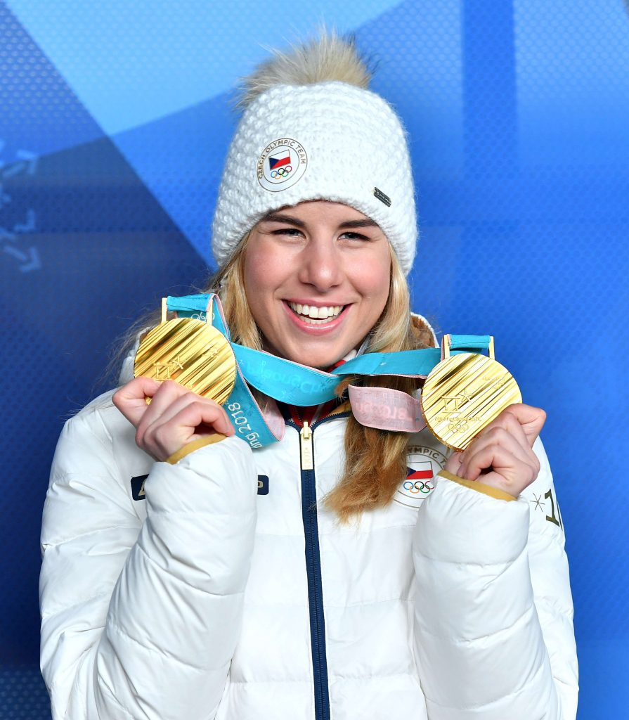 Ester Ledecká with her Super G and Snowboard PGS Olympic gold medals