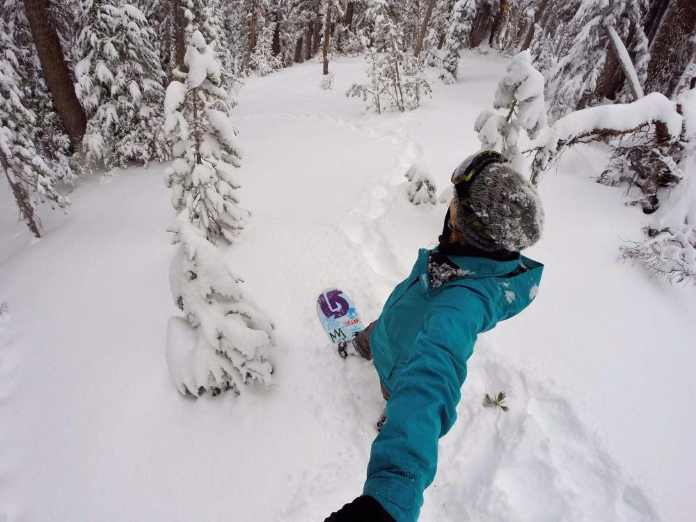 Kimmy Fasani riding deep in the backcountry